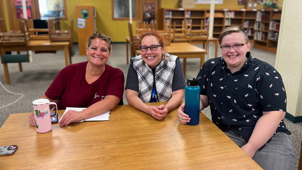 Staff smiling together